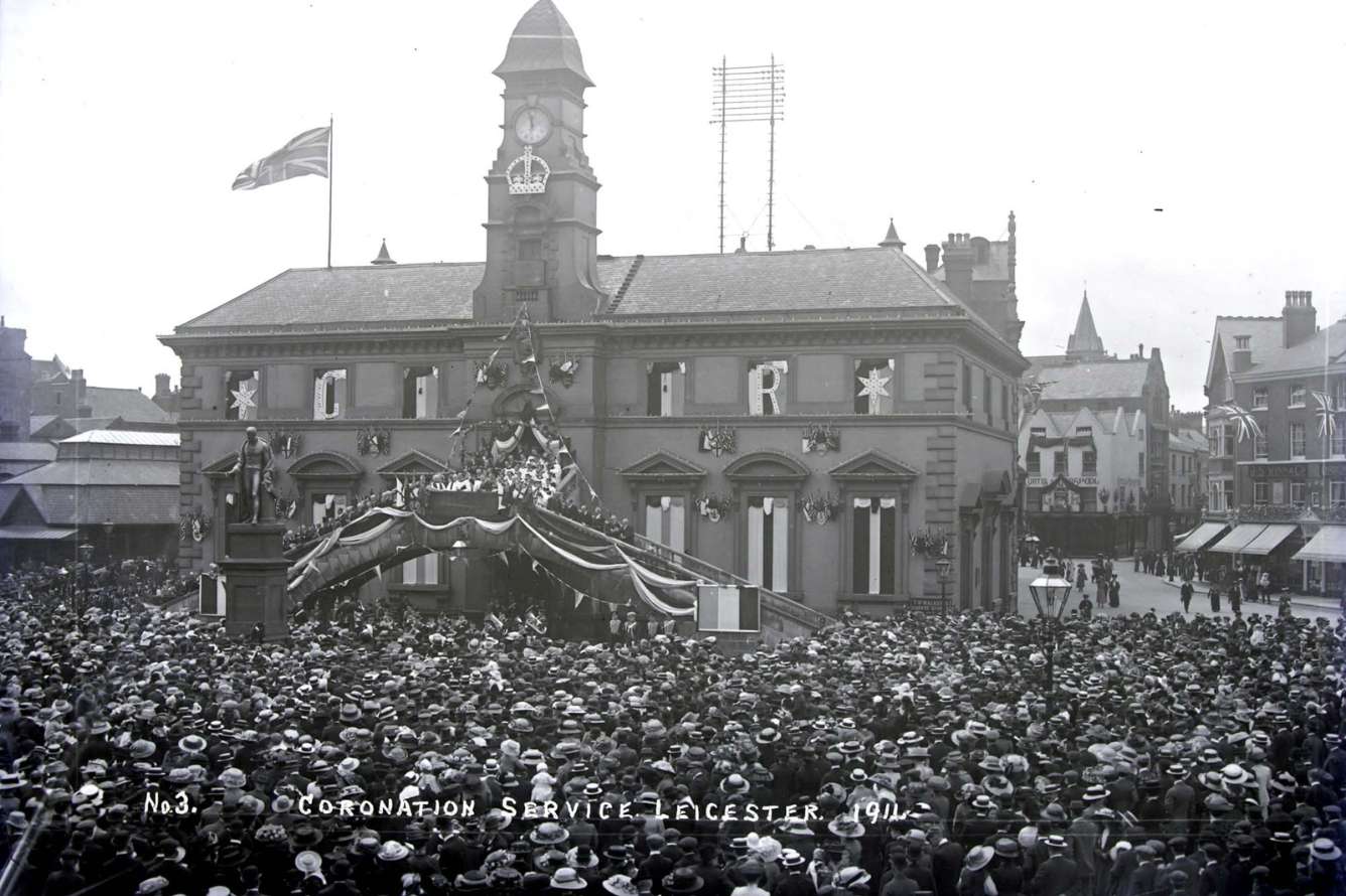 Photo of Leicester Market bustling with people celebrating the coronation of King George V and Queen Mary in 1911.